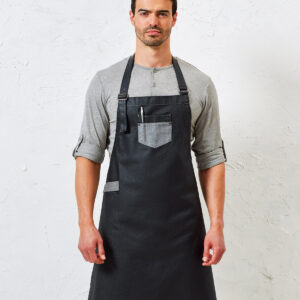 Division waxed-look denim bib apron with faux leather