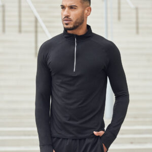 Long-sleeved ¼ zip top